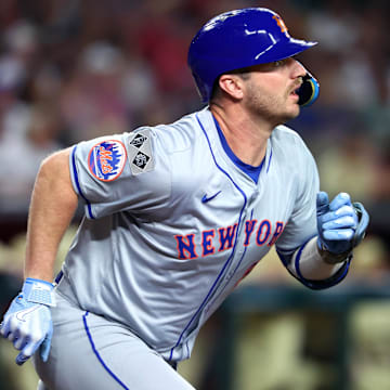 Aug 27, 2024; Phoenix, Arizona, USA; New York Mets first baseman Pete Alonso hits a solo home run in the second inning against the Arizona Diamondbacks at Chase Field.