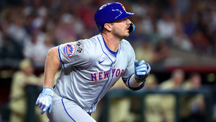 Aug 27, 2024; Phoenix, Arizona, USA; New York Mets first baseman Pete Alonso hits a solo home run in the second inning against the Arizona Diamondbacks at Chase Field.