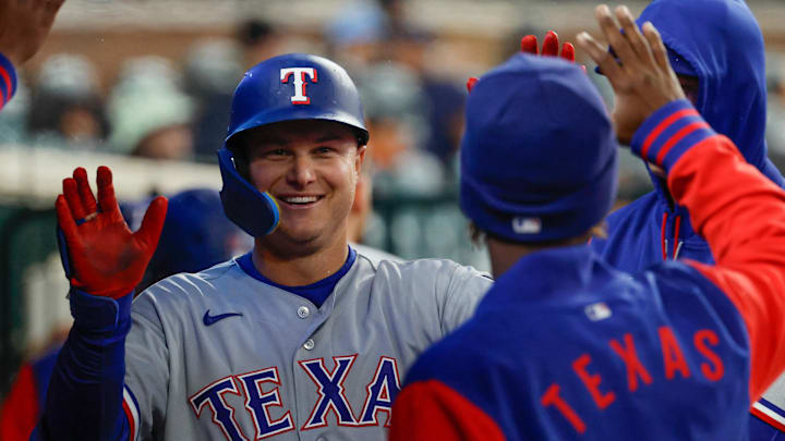 May 1, 2026; Detroit, Michigan, USA;  Texas Rangers first baseman Joc Pederson (3) receives congratulations from teammates after scoring in the third inning against the Detroit Tigers at Comerica Park. Mandatory Credit: Rick Osentoski-Imagn Images
