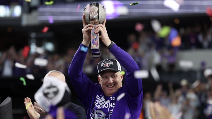Dec 3, 2022; Arlington, TX, USA;  Kansas State Wildcats head coach Chris Klieman holds up the Big 12 Championship trophy after the game against the TCU Horned Frogs at AT&T Stadium. Mandatory Credit: Kevin Jairaj-USA TODAY Sports