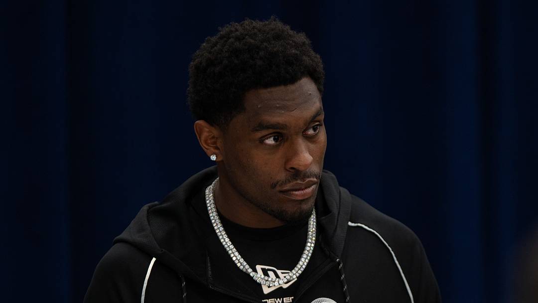Feb 27, 2026; Indianapolis, IN, USA; Oregon wideout Malik Benson (W006) speaks to members of the media during the NFL Combine at the Indiana Convention Center. 