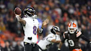Nov 16, 2025; Cleveland, Ohio, USA; Baltimore Ravens quarterback Lamar Jackson (8) throws downfield during the second quarter against the Cleveland Browns at Huntington Bank Field. Mandatory Credit: Scott Galvin-Imagn Images