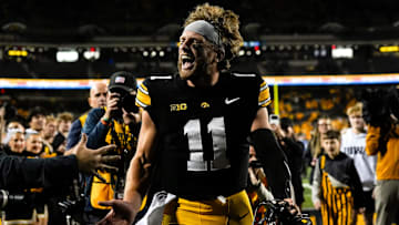 Iowa Hawkeyes quarterback Mark Gronowski (11) celebrates after defeating the Penn State Nittany Lions 25-24 Oct. 18, 2025 at Kinnick Stadium in Iowa City, Iowa.