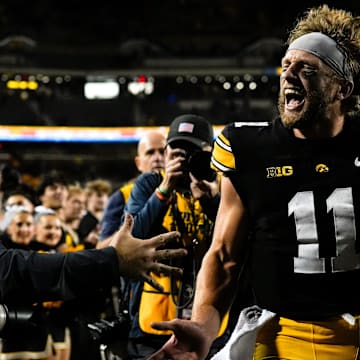 Iowa Hawkeyes quarterback Mark Gronowski (11) celebrates after defeating the Penn State Nittany Lions 25-24 Oct. 18, 2025 at Kinnick Stadium in Iowa City, Iowa.