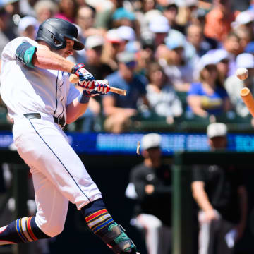 Seattle Mariners left fielder Luke Raley (20) breaks his bat on a ground out during the first inning against the Baltimore Orioles at T-Mobile Park on July 4.
