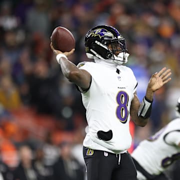 Nov 16, 2025; Cleveland, Ohio, USA; Baltimore Ravens quarterback Lamar Jackson (8) throws downfield during the second quarter against the Cleveland Browns at Huntington Bank Field. Mandatory Credit: Scott Galvin-Imagn Images