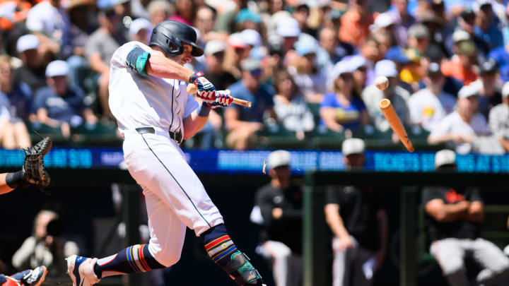 Seattle Mariners left fielder Luke Raley (20) breaks his bat on a ground out during the first inning against the Baltimore Orioles at T-Mobile Park on July 4.