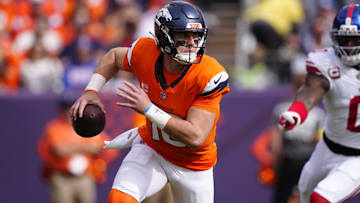Oct 19, 2025; Denver, Colorado, USA; Denver Broncos quarterback Bo Nix (10) runs the ball during the first half against the New York Giants at Empower Field at Mile High.