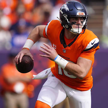 Oct 19, 2025; Denver, Colorado, USA; Denver Broncos quarterback Bo Nix (10) runs the ball during the first half against the New York Giants at Empower Field at Mile High.