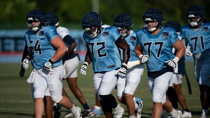 The Tennessee Titans offensive line heads to their next drill during training camp at Ascension Saint Thomas Sports Park in Nashville, Tenn., Wednesday, Aug. 6, 2025. The Tennessee Titans offensive line heads to their next drill during training camp at Ascension Saint Thomas Sports Park in Nashville, Tenn., Wednesday, Aug. 6, 2025.