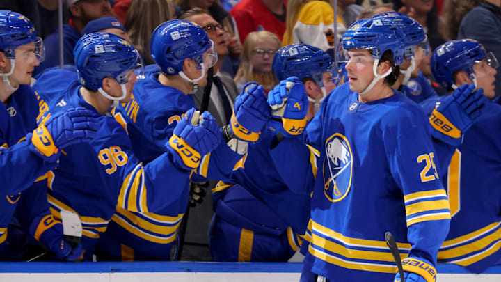 Dec 11, 2024; Buffalo, New York, USA;  Buffalo Sabres defenseman Owen Power (25) celebrates his goal with teammates during the third period against the New York Rangers at KeyBank Center. Mandatory Credit: Timothy T. Ludwig-Imagn Images