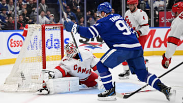 Feb 22, 2025; Toronto, Ontario, CAN;   Toronto Maple Leafs forward John Tavares (91) celebrates after scoring against Carolina Hurricanes goalie Pyotr Kochetkov (52) in the first period at Scotiabank Arena. Mandatory Credit: Dan Hamilton-Imagn Images