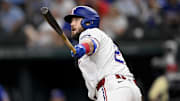 Texas Rangers pinch hitter Jake Burger hits a single and drives in the game winning run against the Arizona Diamondbacks