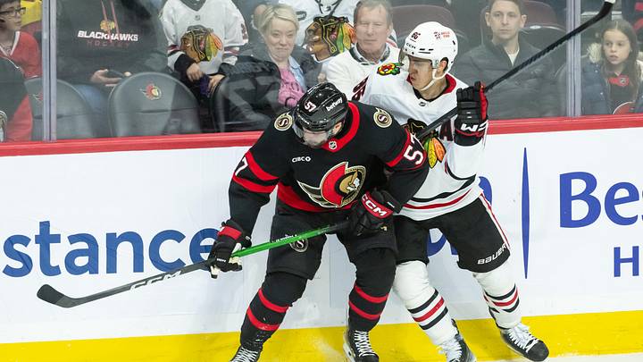 Apr 15, 2025; Ottawa, Ontario, CAN; Ottawa Senators left wing David Perron (57) battles with Chicago Blackhawks center Teuvo Teravainen (86) in the third period at the Canadian Tire Centre. Mandatory Credit: Marc DesRosiers-Imagn Images