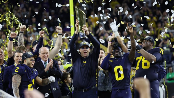 Jim Harbaugh and The Michigan Wolverines celebrate after defeating the Washington Huskies 34-13 to win the CFP National Championship game at NRG Stadium on January 8, 2024 in Houston, Texas.