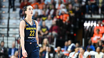 Sep 22, 2024; Uncasville, Connecticut, USA; Indiana Fever guard Caitlin Clark (22) looks at the video board in the fourth quarter against Connecticut Sun during game one of the first round of the 2024 WNBA Playoffs at Mohegan Sun Arena. Mandatory Credit: Mark Smith-Imagn Images