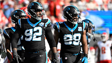 Carolina Panthers DE Jonathan Harris and LB D.J. Wonnum on the field in the first quarter at Bank of America Stadium.
