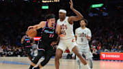 Nov 12, 2025; Miami, Florida, USA; Miami Heat forward Jaime Jaquez Jr. (11) drives to the basket against Cleveland Cavaliers forward Nae’Qwan Tomlin (35) during the fourth quarter at Kaseya Center. Mandatory Credit: Sam Navarro-Imagn Images