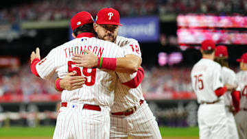 Philadelphia Phillies DH Kyle Schwarber and manager Rob Thomson
