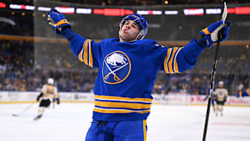 JJ Peterka (77) celebrating one of his three goals in a game against the Boston Bruins earlier this year. 
