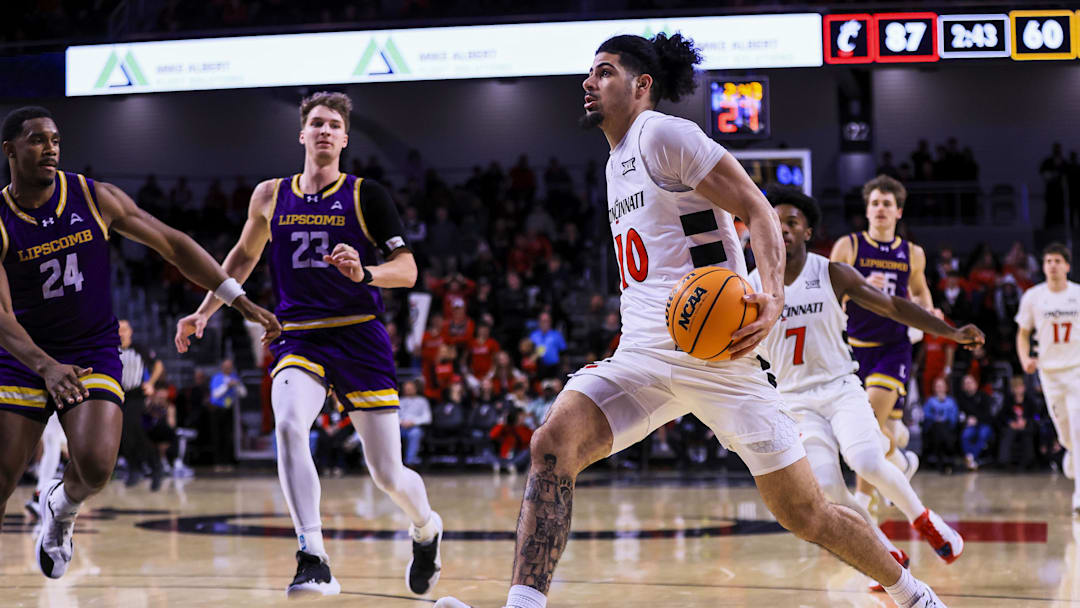 Dec 29, 2025; Cincinnati, Ohio, USA; Cincinnati Bearcats guard Shon Abaev (10) drives to the basket against the Lipscomb Bisons in the second half at Fifth Third Arena. Mandatory Credit: Katie Stratman-Imagn Images Dec 29, 2025; Cincinnati, Ohio, USA; Cincinnati Bearcats guard Shon Abaev (10) drives to the basket against the Lipscomb Bisons in the second half at Fifth Third Arena. Mandatory Credit: Katie Stratman-Imagn Images