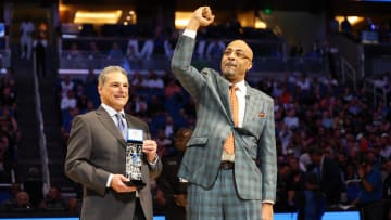 Mar 23, 2023; Orlando, Florida, USA;  Magic CEO Alex Martins introduces former forward Dennis Scott into the Orlando Magic Hall of Fame during their game against the New York Knicks at Amway Center. 