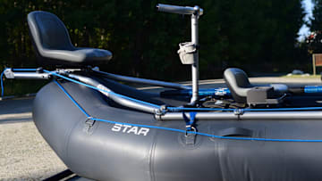 An inflatable fishing raft ready to hit the water.