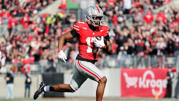 Nov 1, 2025; Columbus, Ohio, USA;  Ohio State Buckeyes wide receiver Carnell Tate (17) catches a long pass during the third quarter against the Penn State Nittany Lions at Ohio Stadium. Mandatory Credit: Joseph Maiorana-Imagn Images