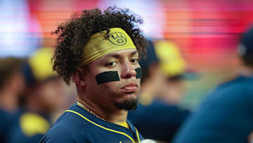 Aug 5, 2025; Atlanta, Georgia, USA; Milwaukee Brewers designated hitter William Contreras (24) in the dugout against the Atlanta Braves in the seventh inning at Truist Park. Mandatory Credit: Brett Davis-Imagn Images