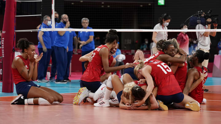Aug 8, 2021; Tokyo, Japan; USA reacts after beating Brazil in the women's volleyball gold medal match during the Tokyo 2020 Olympic Summer Games at Ariake Arena.