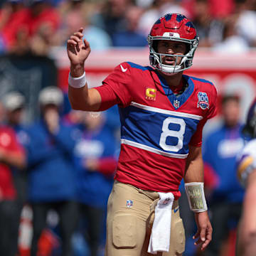 Sep 8, 2024; East Rutherford, New Jersey, USA; New York Giants quarterback Daniel Jones (8) signals during the first half against the Minnesota Vikings at MetLife Stadium. Mandatory Credit: Vincent Carchietta-Imagn Images