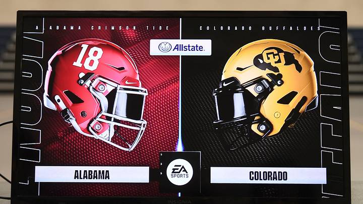 Kids play each other on the new EA Sports College Football 25 video game at the McDonald Hughes Center in Tuscaloosa.