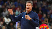 Oct 18, 2024; Lawrence, KS, USA; Kansas Jayhawks head coach Bill Self speaks to the crowd during Late Night in the Phog at Allen Fieldhouse. Mandatory Credit: Jay Biggerstaff-Imagn Images