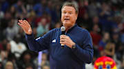 Oct 18, 2024; Lawrence, KS, USA; Kansas Jayhawks head coach Bill Self speaks to the crowd during Late Night in the Phog at Allen Fieldhouse. Mandatory Credit: Jay Biggerstaff-Imagn Images