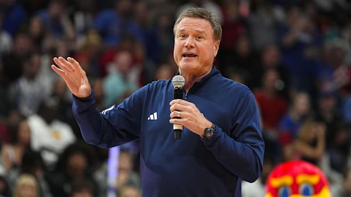 Oct 18, 2024; Lawrence, KS, USA; Kansas Jayhawks head coach Bill Self speaks to the crowd during Late Night in the Phog at Allen Fieldhouse. Mandatory Credit: Jay Biggerstaff-Imagn Images Oct 18, 2024; Lawrence, KS, USA; Kansas Jayhawks head coach Bill Self speaks to the crowd during Late Night in the Phog at Allen Fieldhouse. Mandatory Credit: Jay Biggerstaff-Imagn Images