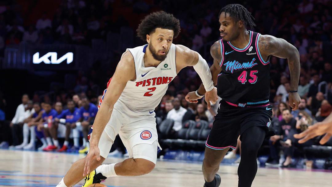 Nov 29, 2025; Miami, Florida, USA; Detroit Pistons guard Cade Cunningham (2) drives to the basket against Miami Heat guard Davion Mitchell (45) during the second half at Kaseya Center. Mandatory Credit: Rhona Wise-Imagn Images
