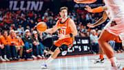Illinois guard Mihailo Petrovic (77) looks for an open teammate in the Illini's 87-73 win over UT Rio Grande Valley on Monday at the State Farm Center in Champaign, Illinois.