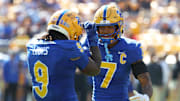 Oct 4, 2025; Pittsburgh, Pennsylvania, USA;  Pittsburgh Panthers linebacker Kyle Louis (9) celebrates his fumble recovery with defensive back Javon McIntyre (7) against the Boston College Eagles during the second quarter at Acrisure Stadium. Mandatory Credit: Charles LeClaire-Imagn Images