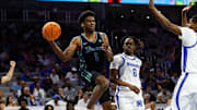 Mar 15, 2025; Fort Worth, TX, USA; Tulane Green Wave forward Kaleb Banks (1) passes the ball ahead of Memphis Tigers guard Baraka Okojie (6) during the first half at Dickies Arena.