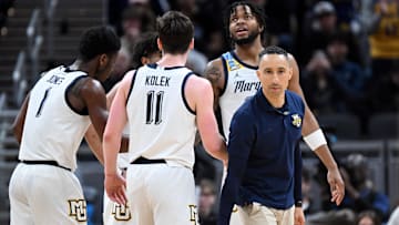Mar 22, 2024; Indianapolis, IN, USA; Marquette Golden Eagles head coach Shaka Smart and team.