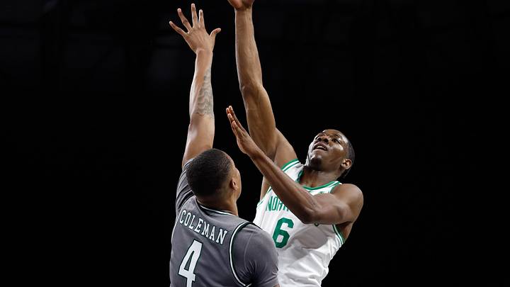 Mar 15, 2025; Fort Worth, TX, USA; North Texas Mean Green forward Brenen Lorient (6) shoots as UAB Blazers forward Christian Coleman (4) defends during the first half at Dickies Arena. Mandatory Credit: Chris Jones-Imagn Images
