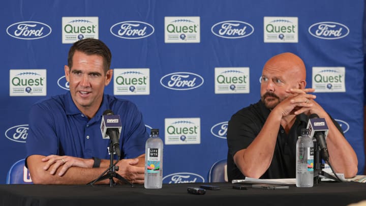 Jul 24, 2024; East Rutherford, NJ, USA; New York Giants general manager Joe Schoen (left) and head coach Brian Dabol talks to media before the start of training camp at Quest Diagnostics Training Facility. Mandatory Credit: Vincent Carchietta-USA TODAY Sports