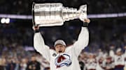 Jun 26, 2022; Tampa, Florida, USA; Colorado Avalanche defenseman Erik Johnson (6) celebrates with the Stanley Cup after the game against the Tampa Bay Lightning in game six of the 2022 Stanley Cup Final at Amalie Arena. Mandatory Credit: Geoff Burke-Imagn Images