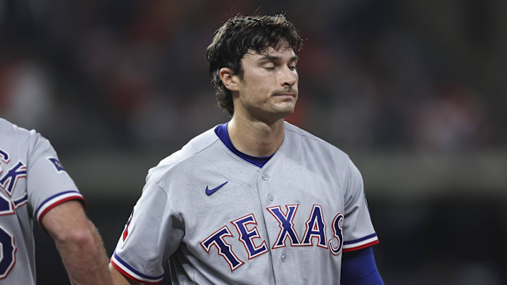 May 15, 2026; Houston, Texas, USA; Texas Rangers second baseman Justin Foscue (14) reacts after being picked off during the eighth inning against the Houston Astros at Daikin Park. Mandatory Credit: Troy Taormina-Imagn Images