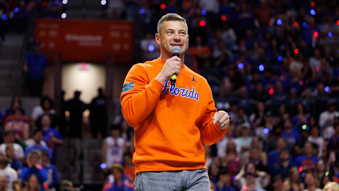 Jan 24, 2026; Gainesville, Florida, USA; Florida Gators Football head coach Jon Sumrall addresses the crowd during a timeout against the Auburn Tigers during the first half at Exactech Arena at the Stephen C. O'Connell Center. Mandatory Credit: Matt Pendleton-Imagn Images