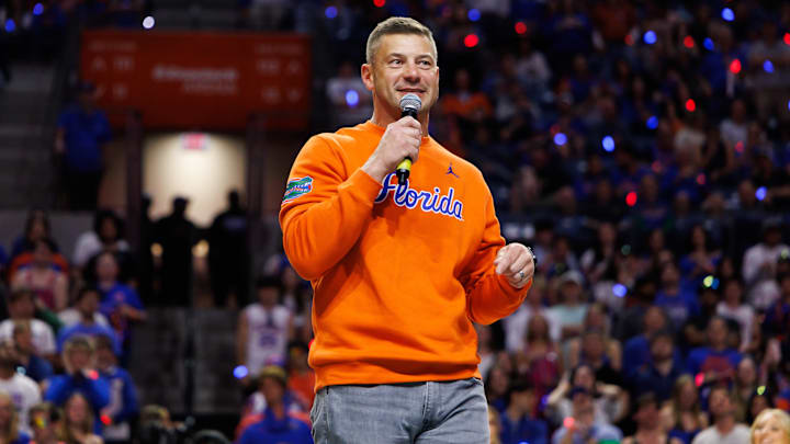 Jan 24, 2026; Gainesville, Florida, USA; Florida Gators Football head coach Jon Sumrall addresses the crowd during a timeout against the Auburn Tigers during the first half at Exactech Arena at the Stephen C. O'Connell Center. Mandatory Credit: Matt Pendleton-Imagn Images