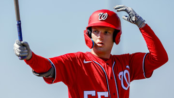 Feb 20, 2023; West Palm Beach, FL, USA; Washington Nationals outfielder Robert Hassell III (55) practices his swing during a spring training workout at The Ballpark of the Palm Beaches.