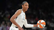 Las Vegas Aces center A'ja Wilson dribbles the ball.