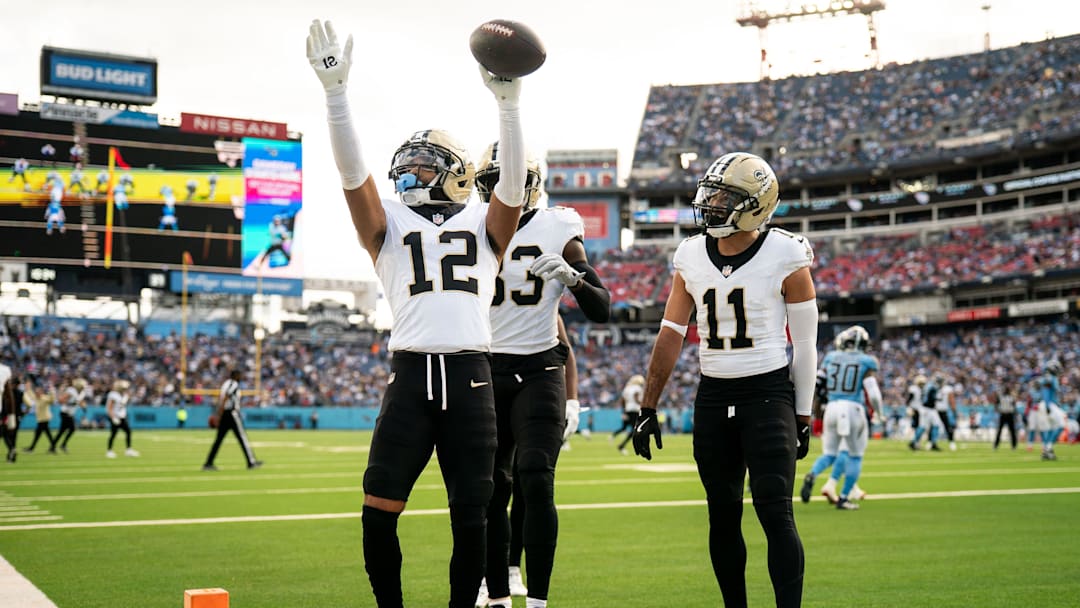 New Orleans Saints wide receiver Chris Olave (12) celebrates his touchdown against the Tennessee Titans during the third quarter at Nissan Stadium in Nashville, Tenn., Sunday, Dec. 28, 2025.
