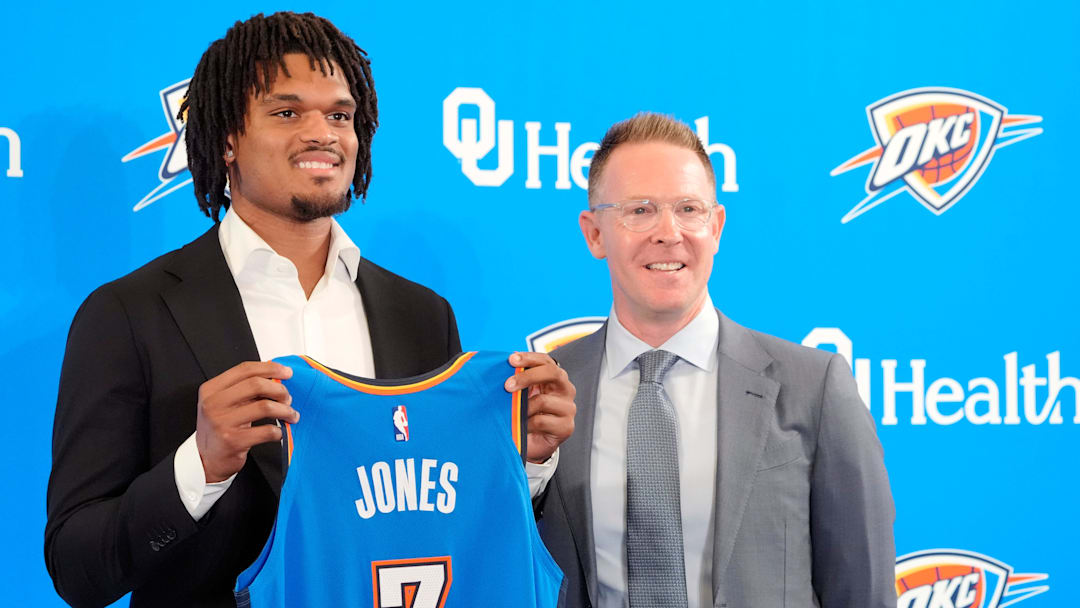 Dillon Jones stands with Thunder general manager Sam Presti during an introductory press conference for the 2024 Thunder draft picks at Oklahoma Contemporary Arts Center in Oklahoma City, Saturday, June, 29, 2024.